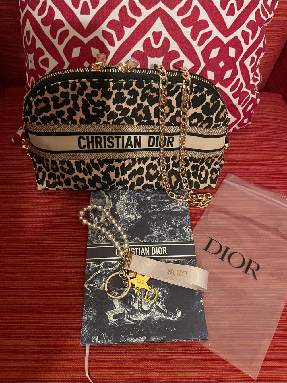 Dior Leopard-Print Crossbody, notebook and keychain